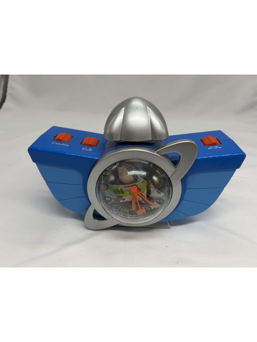 Disney Toy Story Buzz Lightyear Analog AM/FM Clock Radio, Blue/Silver Plastic